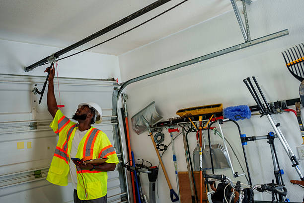 Professional Garage Door Panel Replacement technician working in East Village, CT